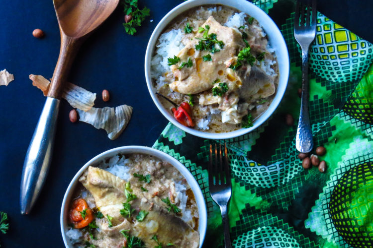 Warm West African Peanut Soup with Tilapia served over a bed of fragrant Jasmine rice