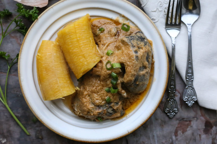 Cameroon Njangsang sauce with Trout , served with ripe plantains