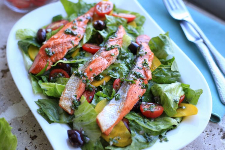Grilled salmon salad with romaine and yellow beets