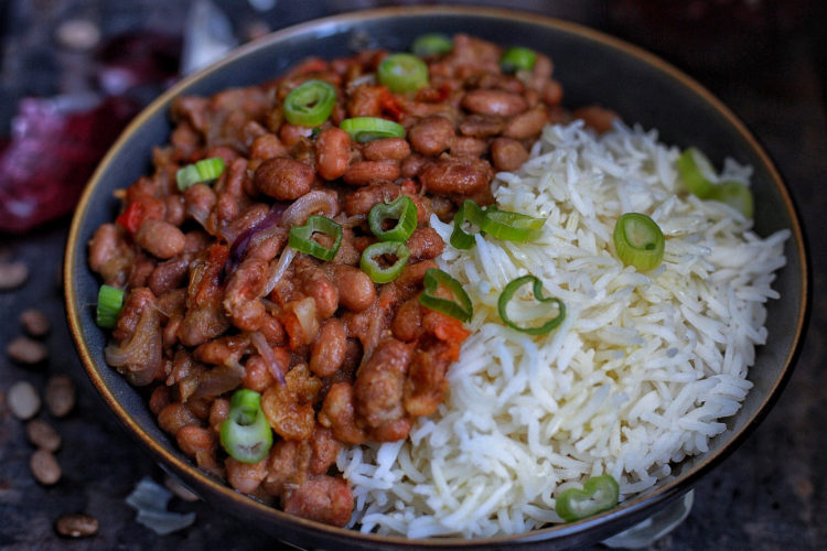 Stewed pinto beans served with basmati rice